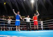 2 June 2024; Davit Chaloyan of Armenia, left, is declared victorious against Martin McDonagh of Ireland, after their Men's +92kg Finals at the Paris 2024 Olympic Boxing Qualification Tournament at Hua Mak Indoor Stadium in Bangkok, Thailand. Photo by Joe Walsh/Sportsfile
