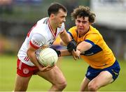 2 June 2024; Darragh Canavan of Tyrone in action against Manus Doherty of Clare during the GAA Football All-Ireland Senior Championship Round 2 match between Tyrone and Clare at O'Neill's Healy Park in Omagh, Tyrone. Photo by Oliver McVeigh/Sportsfile