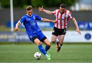 3 June 2024; Kacper Radkowski of Waterford in action against Michael Duffy of Derry City during the SSE Airtricity Men's Premier Division match between Derry City and Waterford at The Ryan McBride Brandywell Stadium in Derry. Photo by Ben McShane/Sportsfile
