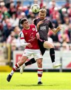 3 June 2024; Paul Doyle of Dundalk in action against Kian Leavy of St Patrick's Athletic during the SSE Airtricity Men's Premier Division match between St Patrick's Athletic and Dundalk at Richmond Park in Dublin. Photo by Ramsey Cardy/Sportsfile