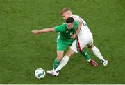 4 June 2024; Josh Cullen of Republic of Ireland in action against András Schäfer of Hungary during the international friendly match between Republic of Ireland and Hungary at Aviva Stadium in Dublin. Photo by Michael P Ryan/Sportsfile