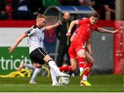 7 June 2024; Paul Doyle of Dundalk in action against Sean Gannon of Shelbourne during the SSE Airtricity Men's Premier Division match between Shelbourne and Dundalk at Tolka Park in Dublin. Photo by Seb Daly/Sportsfile