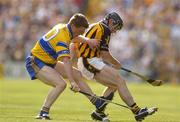 31 July 2004; Niall Gilligan, Clare, in action against Noel Hickey, Kilkenny. Guinness All-Ireland Hurling Championship Quarter Final Replay, Clare v Kilkenny, Semple Stadium, Thurles, Co. Tipperary. Picture credit; Brendan Moran / SPORTSFILE