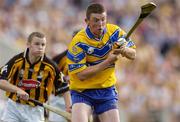 31 July 2004; Diarmuid McMahon, Clare, in action against Tommy Walsh, Kilkenny. Guinness All-Ireland Hurling Championship Quarter Final Replay, Clare v Kilkenny, Semple Stadium, Thurles, Co. Tipperary. Picture credit; Brendan Moran / SPORTSFILE