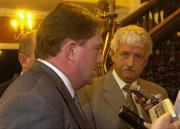 6 August 2004; Fran Rooney, Chief Executive Officer of the FAI, left, and Milo Corcoran, President of the FAI answer questions from jourmnalists after a FAI National Council Meeting in which it was decided to remove Kevin Fahy as Honarary Secretary of the FAI. Citywest Hotel, Dublin. Picture credit; Damien Eagers / SPORTSFILE