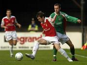 6 August 2004; Aidan O'Keeffe, St. Patrick's Athletic, in action against George O'Callaghan, Cork City. eircom league, Premier Division, St. Patrick's Athletic v Cork City, Richmond Park, Dublin. Picture credit; Brian Lawless / SPORTSFILE