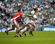 7 August 2004; Shane McDermott, Fermanagh, in action against Aidan O'Rourke and Tony McEntee, Armagh. Bank of Ireland All-Ireland Senior Football Championship Quarter Final, Armagh v Fermanagh, Croke Park, Dublin. Picture credit; Ray McManus / SPORTSFILE