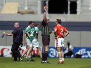 7 August 2004; Enda McNulty, Armagh, is shown the red card by referee John Bannon. Bank of Ireland All-Ireland Senior Football Championship Quarter Final, Armagh v Fermanagh, Croke Park, Dublin. Picture credit; Brendan Moran / SPORTSFILE
