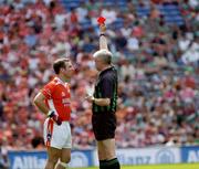 7 August 2004; Enda McNulty, Armagh, is shown the red card by referee John Bannon. Bank of Ireland All-Ireland Senior Football Championship Quarter Final, Armagh v Fermanagh, Croke Park, Dublin. Picture credit; Ray McManus / SPORTSFILE