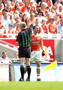 7 August 2004; Enda McNulty, Armagh, is shown the red card by referee John Bannon. Bank of Ireland All-Ireland Senior Football Championship Quarter Final, Armagh v Fermanagh, Croke Park, Dublin. Picture credit; Pat Murphy / SPORTSFILE