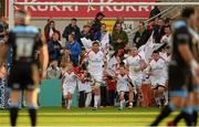 13 September 2013; Johann Muller, Ulster captain, leads his team out for the start of the game. Celtic League 2013/14, Round 2, Ulster v Glasgow Warriors, Ravenhill Park, Belfast, Co. Antrim. Picture credit: Oliver McVeigh / SPORTSFILE