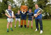 19 September 2013; Pictured at the official launch of Leinster Rugby’s Bank of Ireland Treble Trophy Tour at Newbridge Post Primary School, Co. Kildare, are, from left, Colin Barrett, Luke Doran, DJ Brannock and Leinster academy player and local Newbridge lad, James Tracy. Schools interested in turning their school Leinster Blue and receiving a visit from the treble trophies, the Amlin Challenge Cup, RaboDirect PRO12, British and Irish Cup should email - trophy@leinsterrugby.ie. Supported by Bank of Ireland, Newbridge Post Primary School, was the first school to receive the three trophies on their provincial tour which continues throughout the school year. Leinster fans can keep up to date by following @leinstertrophytour on Twitter or at www.Facebook.com/leinsterrugbytrophytour! Newbridge Post Primary School, Newbridge, Co. Kildare. Picture credit: Barry Cregg / SPORTSFILE