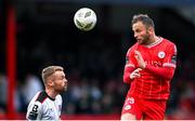 7 June 2024; Paddy Barrett of Shelbourne and Paul Doyle of Dundalk during the SSE Airtricity Men's Premier Division match between Shelbourne and Dundalk at Tolka Park in Dublin. Photo by Seb Daly/Sportsfile