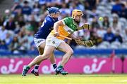 8 June 2024; Cillian Kiely of Offaly in action against Tomás Keyes of Laois during the Joe McDonagh Cup final match between Laois and Offaly at Croke Park in Dublin. Photo by Piaras Ó Mídheach/Sportsfile