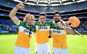 8 June 2024; Offaly players, from left, Ciarán Burke, Cillian Kiely and Ben Conneely celebrate after their side's victory in the Joe McDonagh Cup final match between Laois and Offaly at Croke Park in Dublin. Photo by Piaras Ó Mídheach/Sportsfile