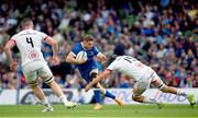 8 June 2024; Jordan Larmour of Leinster is tackled by Greg Jones of Ulsterduring the United Rugby Championship quarter-final match between Leinster and Ulster at Aviva Stadium in Dublin. Photo by Ramsey Cardy/Sportsfile