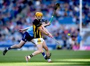 8 June 2024; Richie Reid of Kilkenny gets his shot away despite the efforts of Danny Sutcliffe of Dublin during the Leinster GAA Hurling Senior Championship final match between Kilkenny and Dublin at Croke Park in Dublin. Photo by John Sheridan/Sportsfile