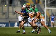 8 June 2024; James Duggan of Laois in action against Dan Bourke of Offaly during the Joe McDonagh Cup final match between Laois and Offaly at Croke Park in Dublin. Photo by Seb Daly/Sportsfile