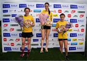 9 June 2024; Women's winner Faye Dervan of Dublin City Harriers AC, centre, with second place Caitlyn Harvey of North East Runners AC, Louth, left, and third place Sarah Mulligan of Dundrum South Dublin AC, right, on the podium at the 2024 Irish Life Dublin Race Series Corkagh Park 5 Mile at Corkagh Park in Dublin. Photo by Seb Daly/Sportsfile