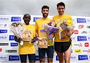 9 June 2024; Men's winner Hugh Armstrong of Ballina AC, Mayo, centre, with second place Peter Somba of Ratoath AC, Meath, left, and third place Tomas Fitzpatrick of Tallaght AC, right, on the podium at the 2024 Irish Life Dublin Race Series Corkagh Park 5 Mile at Corkagh Park in Dublin. Photo by Seb Daly/Sportsfile