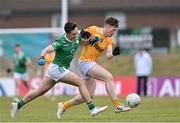 9 June 2024; Ryan McQuillan of Antrim in action against Eoin Walsh of London during the Tailteann Cup preliminary quarter-final match between Antrim and London at Corrigan Park in Belfast. Photo by Stephen Marken/Sportsfile