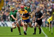 9 June 2024; John Conlon of Clare in action against Cathal O'Neill and Gearóid Hegarty of Limerick during the Munster GAA Hurling Senior Championship final match between Clare and Limerick at FBD Semple Stadium in Thurles, Tipperary. Photo by Brendan Moran/Sportsfile