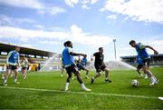 10 June 2024; Players, from left, Jake O'Brien, Michael Obafemi, coach Stephen Rice and Seamus Coleman during a Republic of Ireland training session at Estádio de São Miguel in Gondomar, Portugal. Photo by Stephen McCarthy/Sportsfile