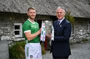 11 June 2024; Seamus Flanagan of Limerick with Uachtarán Chumann Lúthchleas Gael Jarlath Burns and the Liam MacCarthy cup during the national launch of the GAA Hurling All-Ireland Senior Championship at the Michael Cusack Centre in Carran, Clare. Photo by Brendan Moran/Sportsfile