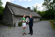 11 June 2024; Seamus Flanagan of Limerick with Uachtarán Chumann Lúthchleas Gael Jarlath Burns and the Liam MacCarthy cup during the national launch of the GAA Hurling All-Ireland Senior Championship at the Michael Cusack Centre in Carran, Clare. Photo by Brendan Moran/Sportsfile