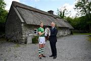 11 June 2024; Seamus Flanagan of Limerick with Uachtarán Chumann Lúthchleas Gael Jarlath Burns and the Liam MacCarthy cup during the national launch of the GAA Hurling All-Ireland Senior Championship at the Michael Cusack Centre in Carran, Clare. Photo by Brendan Moran/Sportsfile