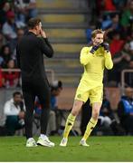 11 June 2024; Republic of Ireland goalkeeper Caoimhin Kelleher with Republic of Ireland goalkeeping coach Rene Gilmartin during the international friendly match between Portugal and Republic of Ireland at Estádio Municipal de Aveiro in Aveiro, Portugal. Photo by Stephen McCarthy/Sportsfile