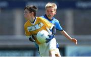 14 June 2024; Ronan McKenna of Antrim in action against Jonah O'Connor of Dublin during the friendship games between Dublin Cumann na mBunscol and Antrim Cumann na mBunscol at Parnell Park in Dublin. Photo by Shauna Clinton/Sportsfile