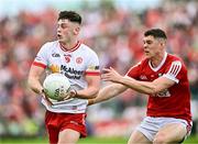 15 June 2024; Ben Cullen of Tyrone in action against Rory Maguire of Cork during the GAA Football All-Ireland Senior Championship Round 3 match between Cork and Tyrone at Glenisk O'Connor Park in Tullamore, Offaly. Photo by Piaras Ó Mídheach/Sportsfile