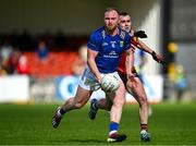 15 June 2024; Eoin Murtagh of Wicklow in action against Conor McCrickard of Down during the Tailteann Cup quarter-final match between Down and Wicklow at Páirc Esler in Newry, Down. Photo by Sam Barnes/Sportsfile