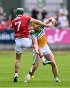 15 June 2024; Killian Sampson of Offaly in action against Mark Coleman of Cork during the GAA Hurling All-Ireland Senior Championship preliminary quarter-final match between Offaly and Cork at Glenisk O'Connor Park in Tullamore, Offaly. Photo by Piaras Ó Mídheach/Sportsfile
