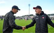 15 June 2024; Derry manager Mickey Harte, right, shakes hands with Westmeath manager Dessie Dolan after the GAA Football All-Ireland Senior Championship Round 3 match between Derry and Westmeath at Páirc Esler in Newry, Down. Photo by Sam Barnes/Sportsfile