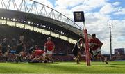 15 June 2024; Antoine Frisch of Munster on the way to scoring his side's first try despite the efforts of Sebastian Cancelliere of Glasgow Warriors during the United Rugby Championship semi-final match between Munster and Glasgow Warriors at Thomond Park in Limerick. Photo by Brendan Moran/Sportsfile