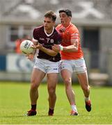 16 June 2024; Liam Silke of Galway is tackled by Rory Grugan of Armagh during the GAA Football All-Ireland Senior Championship Round 3 match between Armagh and Galway at Markievicz Park in Sligo. Photo by Brendan Moran/Sportsfile