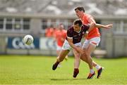 16 June 2024; Liam Silke of Galway is tackled by Rory Grugan of Armagh during the GAA Football All-Ireland Senior Championship Round 3 match between Armagh and Galway at Markievicz Park in Sligo. Photo by Brendan Moran/Sportsfile