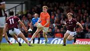 16 June 2024; Conor Turbitt of Armagh in action against John Maher and Johnny McGrath of Galway during the GAA Football All-Ireland Senior Championship Round 3 match between Armagh and Galway at Markievicz Park in Sligo. Photo by Brendan Moran/Sportsfile