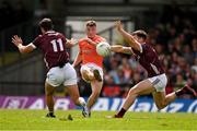 16 June 2024; John Maher and Liam Silke of Galway block a shot by Peter McGrane of Armagh during the GAA Football All-Ireland Senior Championship Round 3 match between Armagh and Galway at Markievicz Park in Sligo. Photo by Brendan Moran/Sportsfile