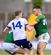 16 June 2024; Jack McCarron of Monaghan tussles with Ronan Ryan, left, and Ciarán Caulfield of Meath during the GAA Football All-Ireland Senior Championship Round 3 match between Monaghan and Meath at Kingspan Breffni in Cavan. Photo by Ben McShane/Sportsfile