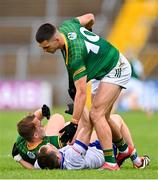 16 June 2024; Jack McCarron of Monaghan tussles with Ronan Ryan, left, and Ciarán Caulfield of Meath during the GAA Football All-Ireland Senior Championship Round 3 match between Monaghan and Meath at Kingspan Breffni in Cavan. Photo by Ben McShane/Sportsfile
