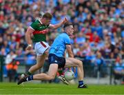 16 June 2024; Ryan O'Donoghue of Mayo has a shot on goal blocked by Brian Fenton of Dublin during the GAA Football All-Ireland Senior Championship Round 3 match between Dublin and Mayo at Dr Hyde Park in Roscommon. Photo by Ray McManus/Sportsfile
