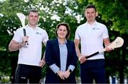 20 June 2024; ord Gáis Energy has announced new customers can avail of 33% off their residential electricity plans for the next 12 months when you switch before June 30th. Fresh from Provincial Hurling Final success in Munster, Bord Gáis Energy Hurling ambassadors Eoin Cody, left, and Gearóid Hegarty, right, with Bord Gáis Energy director of energy and marketing Catherine Lonergan were on hand to launch the new offer. For more information on how to save big on electricity, you can visit www.bordgaisenergy.ie/campaigns-info/electricity-plans. Offer excludes Smart Free Time Sat/Sun plan. Ts&Cs apply. See www.bordgaisenergy.ie for details. Photo by Seb Daly/Sportsfile