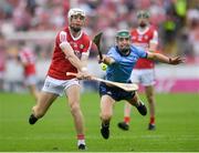 22 June 2024; Luke Meade of Cork in action against Chris Crummey of Dublin during the GAA Hurling All-Ireland Senior Championship quarter-final match between Dublin and Cork at FBD Semple Stadium in Thurles, Tipperary. Photo by John Sheridan/Sportsfile