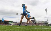 22 June 2024; Chris Crummey of Dublin, left and Eoghan O'Donnell run onto the pitch before during the GAA Hurling All-Ireland Senior Championship quarter-final match between Dublin and Cork at FBD Semple Stadium in Thurles, Tipperary. Photo by John Sheridan/Sportsfile