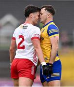 22 June 2024; Michael McKernan of Tyrone and Ultan Harney of Roscommon tussle during the GAA Football All-Ireland Senior Championship preliminary quarter-final match between Tyrone and Roscommon at O'Neill's Healy Park in Omagh, Tyrone. Photo by Ben McShane/Sportsfile