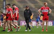 22 June 2024; Derry manager Mickey Harte, centre, and captain Conor Glass as players leave the pitch at half-time of the GAA Football All-Ireland Senior Championship preliminary quarter-final match between Mayo and Derry at Hastings Insurance MacHale Park in Castlebar, Mayo. Photo by Seb Daly/Sportsfile