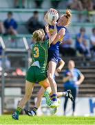 23 June 2024; Aishling Moloney of Tipperary is tackled by Mary Kate Lynch of Meath during the TG4 All-Ireland Ladies Football Senior Championship Round 3 match between Meath and Tipperary at Páirc Tailteann in Navan, Meath. Photo by Brendan Moran/Sportsfile